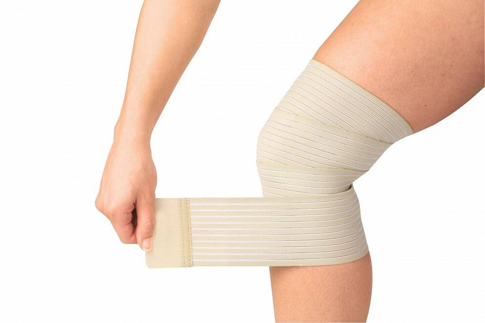 elastic bandage on the knee